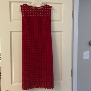 Cute dress for all year! Worn once to wedding. Flattering cut.